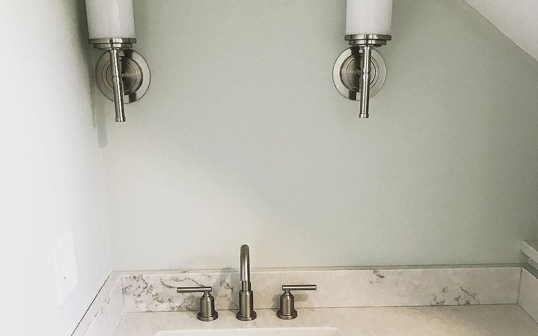 Sconces, countertop, sink & faucet ️ in this small, quirky bathroom #bathroomrenovation #bathroom #mainehomedesign #sconces #quartz #benjaminmoore #homerenovation #homeremodel #interiordesign #smallbutbeautiful #portlandmaine #maine #bluebungalowproject #heartenhome